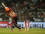 Sunrisers Hyderabad's Travis Head is bowled out by Kolkata Knight Riders' Mitchell Starc during the Indian Premier League qualifier cricket match between Kolkata Knight Riders and Sunrisers Hyderabad in Ahmedabad