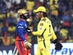 Chennai Super Kings' MS Dhoni and Royal Challengers Bengaluru's Dinesh Karthik during a match.