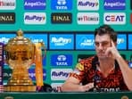 Sunrisers Hyderabad's skipper Pat Cummins with the IPL 2024 trophy during a press conference on the eve of the Indian Premier League (IPL) final match, in Chennai.