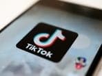 The TikTok logo is displayed on a smartphone screen in Tokyo, Japan. 