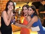 Suhana Khan, Ananya Panday and Shanaya Kapoor posing with the IPL 2024 trophy in bodycon dresses