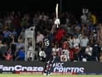 USA's vice-captain Aaron Jones celebrates winning the ICC men's Twenty20 World Cup 2024 group A cricket match