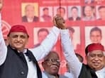 Samajwadi Party chief Akhilesh Yadav with Awadhesh Prasad, the party candidate from Faizabad Lok Sabha constituency, during the election campaign rally in Ayodhya. (Photo from X)