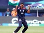 USA's Saurabh Netravalkar celebrates the dismissal of India's captain Rohit Sharma during their Group A match in the ICC T20 World Cup 2024.