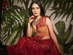 Radhikka ups the glamour quotient in an apple-red, jamdani silk saree from Asha Gautam. The luxurious saree showcases intricate floral motifs in real gold and silver zari, complemented by meenakari work. The designer will participate in FDCI Manifest Wedding Weekend