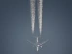 A Boeing 787-8 flies over Dombivli in Thane district, in an image captured by Roshan Rajeev.