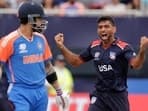 United States' Saurabh Nethralvakar, right, celebrates the dismissal of India's Virat Kohli, left, during the ICC Men's T20 World Cup cricket match between United States and India at the Nassau County International Cricket 