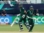 Pakistan's captain Babar Azam and Pakistan's Mohammad Rizwan run between the wickets during the ICC men's Twenty20 World Cup 2024 group A cricket match between Pakistan and Canada 
