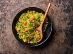 This image released by Milk Street shows a recipe for curried chicken fried rice. 