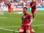 Serbia's Luka Jovic celebrates after scoring his side first goal during a Group C match between Slovenia and Serbia at the Euro 2024 soccer tournament in Munich, Germany