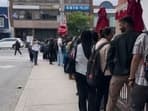 Students queue up for a job fair in Canada's Toronto.