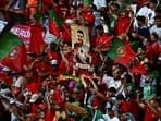 Supporters of Portugal hold an image of Portugal's forward #07 Cristiano Ronaldo in the tribune prior to the UEFA Euro 2024 Group F football match between Portugal and the Czech Republic at the Leipzig Stadium