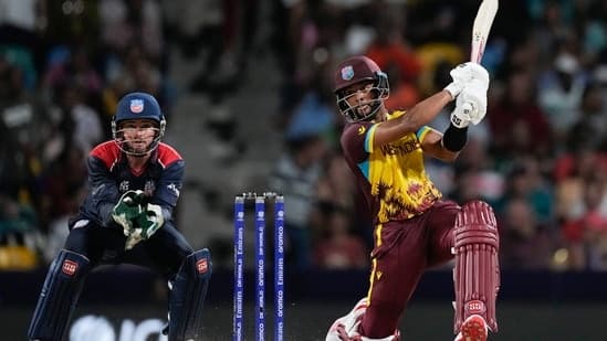 West Indies' Shai Hope hits a six during the men's T20 World Cup cricket match between the USA and the West Indies