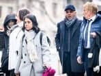 Indian-Swiss billionaire family members Namrata Hinduja (L) and Ajay Hinduja (2ndR) arrive at the Geneva's courthouse with their lawyers Yael Hayat (C) and Robert Assael (R).