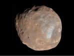 Phobos is the larger of Mars' two moons. 