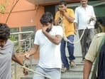 Economic Offences Unit officials leave with the accused arrested in the NEET paper leak case, in Patna, on Sunday. (PTI)