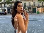 Janhvi Kapoor wears a backless floral dress during an outing in Paris. 