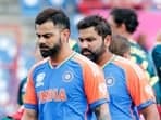 India's captain Rohit Sharma and teammate Virat Kohli during the Super 8 Group 1 match against Australia 