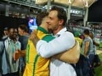 South Africa's David Miller hugs former player Dale Steyn