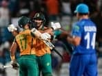 South Africa's Aiden Markram and Reeza Hendricks celebrate after beating Afghanistan