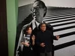 Sandi Pei (R), son of renowned Chinese-American architect I.M. Pei, is photographed in front of a photo of his father after a media preview of "I. M. Pei: Life Is Architecture", the first full-scale retrospective of I. M. Pei (1917-2019), one of the most influential architects of the twentieth and twenty-first centuries at the M+ art museum in Hong Kong.