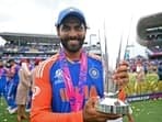 India's Ravindra Jadeja poses for a picture with the trophy after Team India wins the ICC Mens T20 World Cup 2024 final