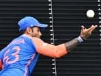 India's Suryakumar Yadav grabs a catch to dismiss South Africa's David Miller during the ICC men's Twenty20 World Cup 2024 final.