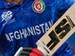 Afghanistan team logo is seen on a player's uniform during the men's T20 World Cup cricket match between Afghanistan and Bangladesh 