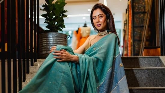 Sukhmani Sadana in an elegant yet subtle turquoise colored saree