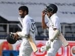 Latest news on September 20, 2024: Jasprit Bumrah (L) and Mohammed Siraj return after India bowled out for 376