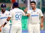 India's captain Rohit Sharma and teammates celebrates a dismissal of Bangladesh during Day 5 of the second test match