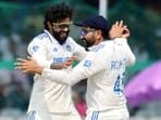 India's captain Rohit Sharma and Ravindra Jadeja celebrate a dismissal.