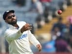 Rohit Sharma throws the ball during the day one of the second cricket Test match between India and New Zealand.