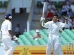 Sachin Tendulkar raises his bat after scoring a century against Australia in Perth during India’s 1991-92 tour Down Under.