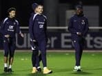 (L-R) France's midfielder #18 Warren Zaire Emery, France's goalkeeper Lucas Chevalier and France's midfielder Manu Kone attend a training session in Clairefontaine-en-Yvelines on November 11, 2024 as part of the team's preparation for upcoming UEFA Nations League qualifying matches against Israel and Italy.